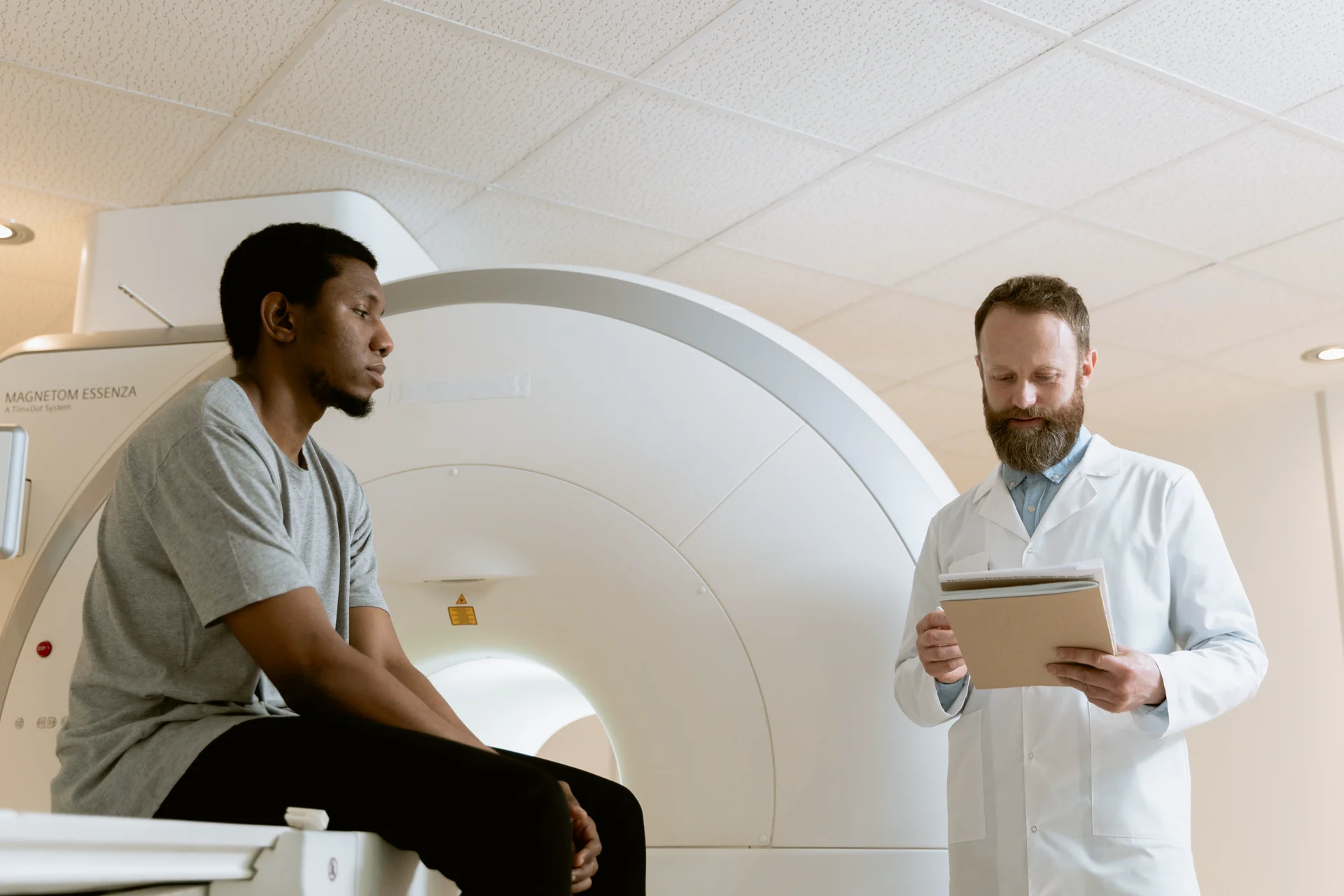 A clinician discussing records with a patient.